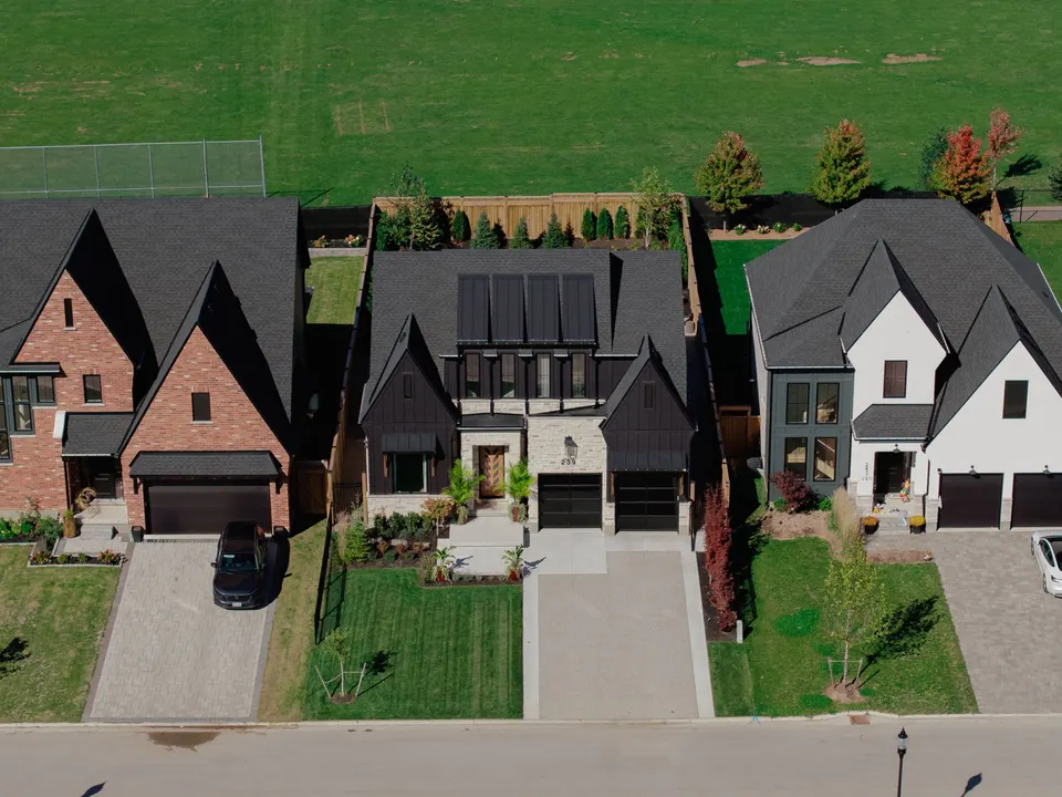 Aerial view of the home and driveway