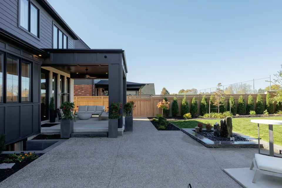 Covered porch, patio and garden with water feature